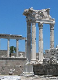 Ancient ruins with white pillars.